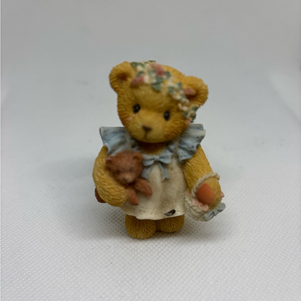 Adorable Bear Figurine with Blue Accents